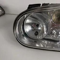 Linker Frontscheinwerfer OEM JPF1J1941016B für VW Golf IV