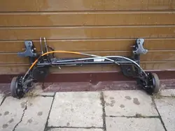 OEM OŚ BELKA TYLNA BĘBNY Bakaxel för Renault Twingo II