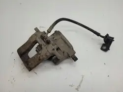 Pinza de freno trasera derecha OEM AUST131654 - Usada