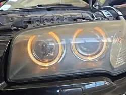 Farol esquerdo Bi-Xenon BMW X3 E83 06-10 OEM 7162191