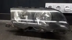 Farol dianteiro direito BMW E46