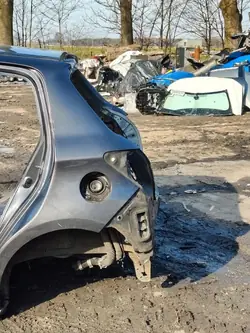 ĆWIARTKA BŁOTNIK LEWY TYLNY TOYOTA YARIS III