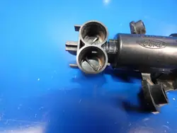 Bico lavador farol dianteiro esquerdo OEM 3312196
