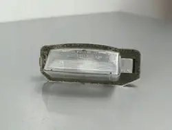 Mitsubishi OE FOB20704 Kennzeichenleuchte