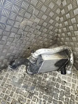 Audi Intercooler OEM 4F0145737K - Vasen puoli