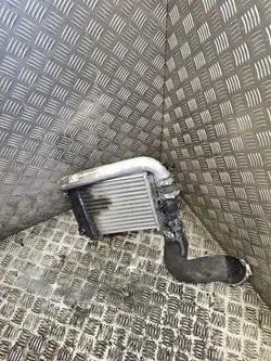 Audi Intercooler OEM 4F0145737K - Linkerkant