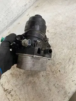 VW Öljysuodattimen kiinnike OEM 03N11721 Touran 1.6L Diesel