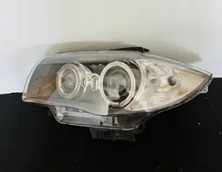 Farol Esquerdo BMW E87 E88 Série 1 Bi-Xenon OEM 90004813