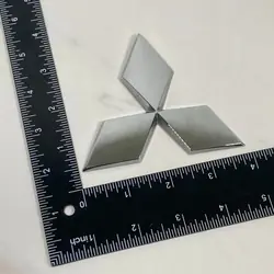 Emblème OEM 7415A389 pour coffre Mitsubishi Space Star