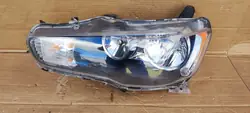Faros delanteros izquierdo Mitsubishi Lancer X
