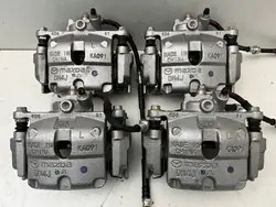 Pinça de freio dianteira esquerda MAZDA MX30 OEM com pastilhas