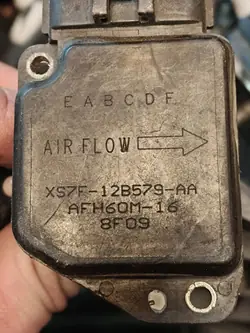 Débitmètre d'air Ford Mondeo Mk3 XS7F12B579AA