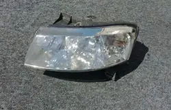 Farol dianteiro esquerdo Fiat Stilo Lift