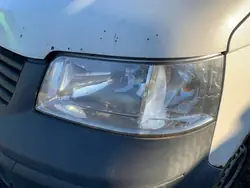 VW T5 linke Frontscheinwerfer - Originalteil