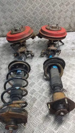 Amortecedor Traseiro Esquerdo Direito Mazda 323F BA