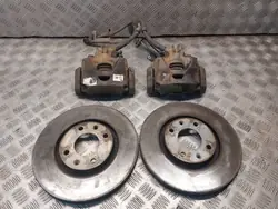 Gebrauchte Bremsscheiben + Beläge + Bremszangen Vorne Citroen