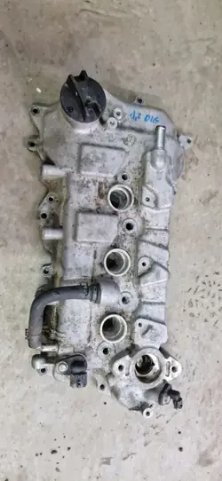 Tampa de válvulas Nissan OEM 1487291932 Micra K13