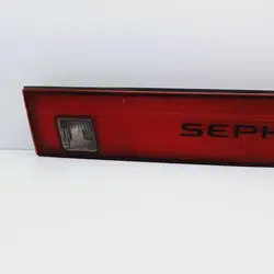 Moldura de porta-malas Kia Sephia OEM DRC83584 Usado