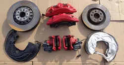 Juego de discos y pinzas OEM 10000 para Audi
