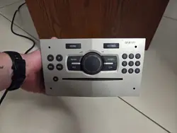 Radio OEM 13254191 con PIN para Opel Corsa D MP3