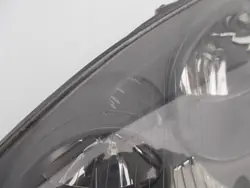 Phare avant VW Golf V 5 gauche Hella