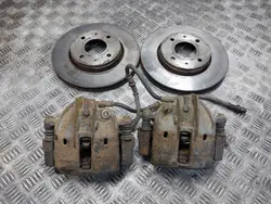 Gebrauchte Bremsscheiben + Beläge + Sattel Volvo V40