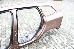 Volvo XC60 I vasen takalokasuojus OEM 1274734590