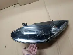 RENAULT MEGANE III LIFT 13- VASEN VALOTTAJARE REFLEKTORI OEM