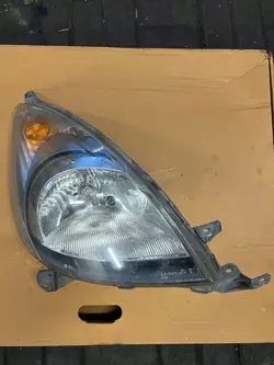 Toyota Yaris Verso I Rechter Frontscheinwerfer OEM 0498