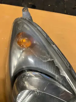 Toyota Yaris Verso I Rechter Frontscheinwerfer OEM 0498