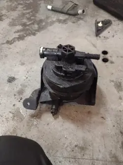 Bränslefilterhus Mitsubishi Lancer VIII OEM 87654D
