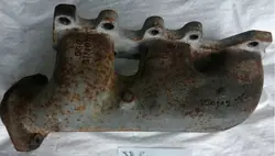Uitlaatspruitstuk Mercedes W124 OEM 1041421901