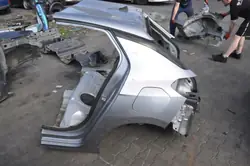 Opel Corsa F bakre panel OEM 260484