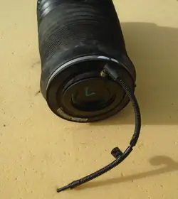 Takana Vasemman Ilmapussi Grand Cherokee WK2 OEM