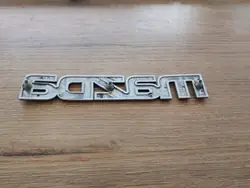 Mazda MPV Takaluukun Embleemi OEM LC6351710 00-06