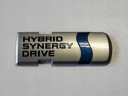 Toyota Yaris III Hybrid bakluckemblem OEM A75441-52120