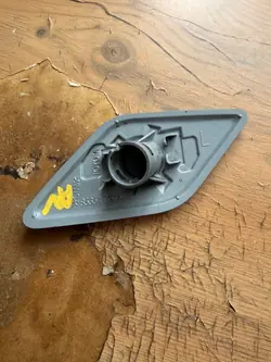 Tapón lavafaros Toyota Avensis OEM 270211 izquierdo
