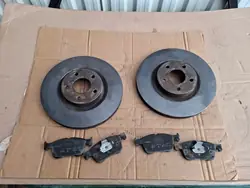 Discos de freno delanteros Ford OEM JX61-1125-BEB (Usados)