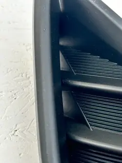 TOYOTA HIGHLANDER 20- Linke Frontstoßstangenblende 52040-0E110