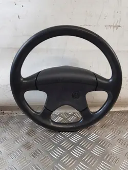 Volante OEM 1H0419091C + Tapón para VW Golf III