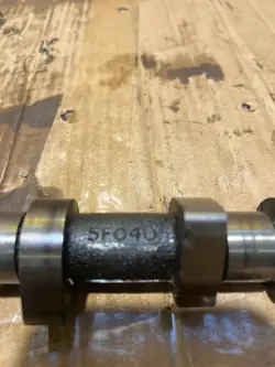 Arbre à cames Nissan OE 5F040 - État utilisé