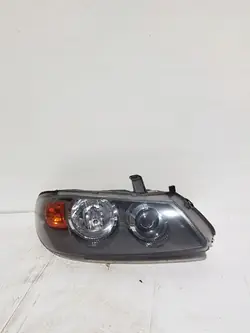 Nissan Almera N16 2004 Oikea ajovalaisin