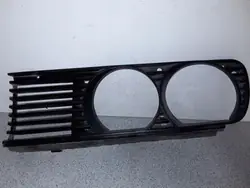 Cobertura farol dianteiro direito BMW 3 E30 OEM 51131945884