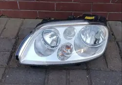 Vasen Etuvalaisin VW Touran I Caddy 03-06