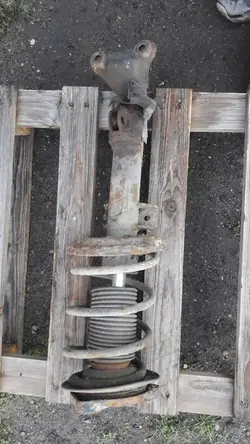 Fram vänster stötdämpare fjäder Mercedes R170 2.3 OEM