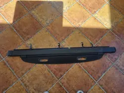 KIA CARENS III 06-12 Tavaratilan verho Musta OEM