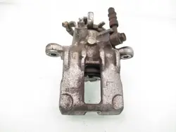 OEM ZACISK LEWY TYŁ NISSAN ALMERA II (N16) 1.5 - GA15DE