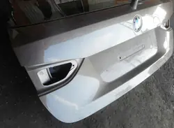 Tapa Maletero BMW X1 E84 OEM B06 SPARKLING BRONZE