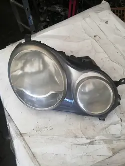 Farol dianteiro direito VW Polo 9N