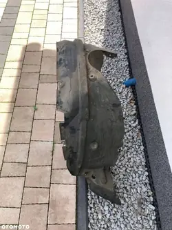 Suzuki SX4 etulokasuoja OEM 7232154L0 - Käytetty